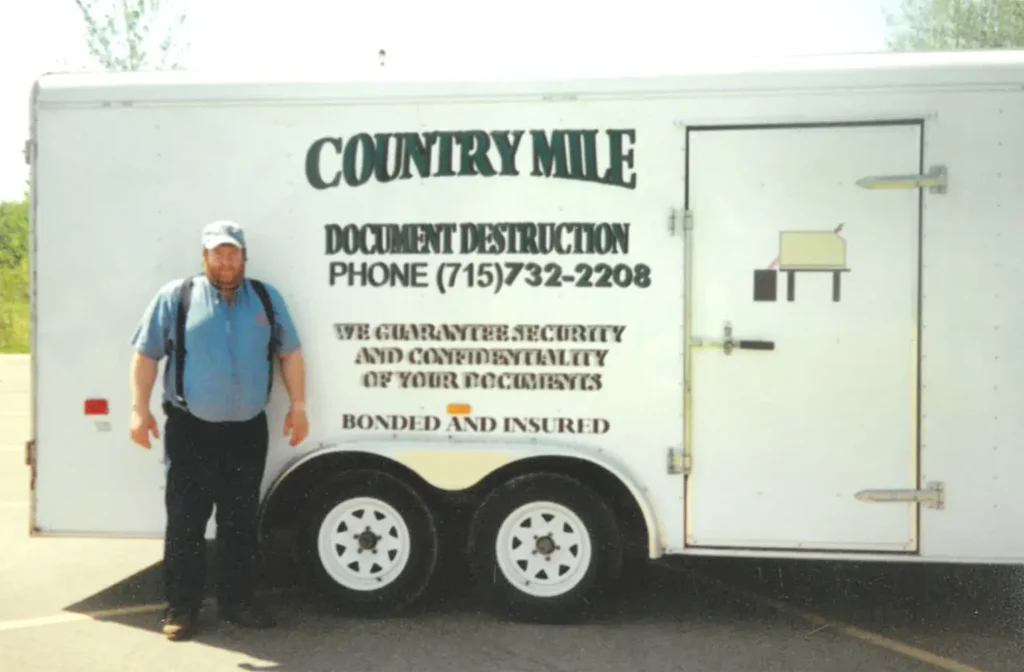Historical photo of Country Mile Document Destruction owner and his traveling shredder truck - 1